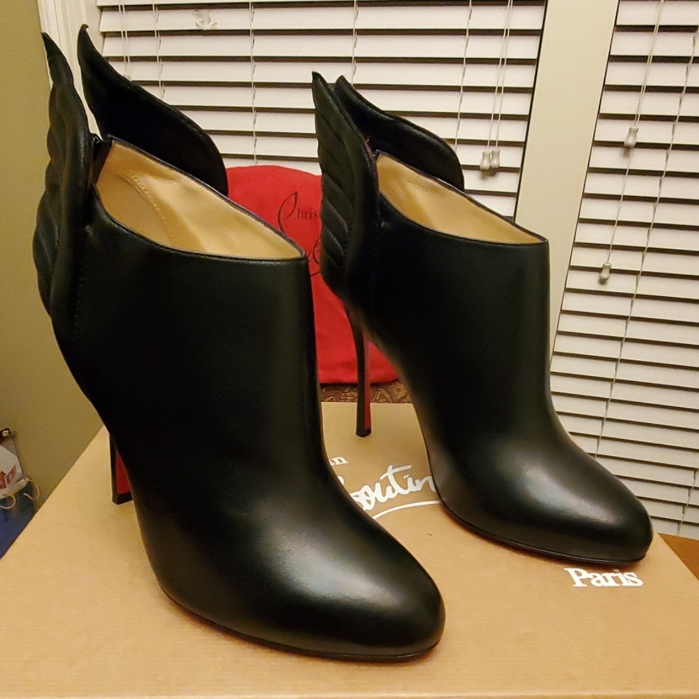 Christian Louboutin Mecura winged booties